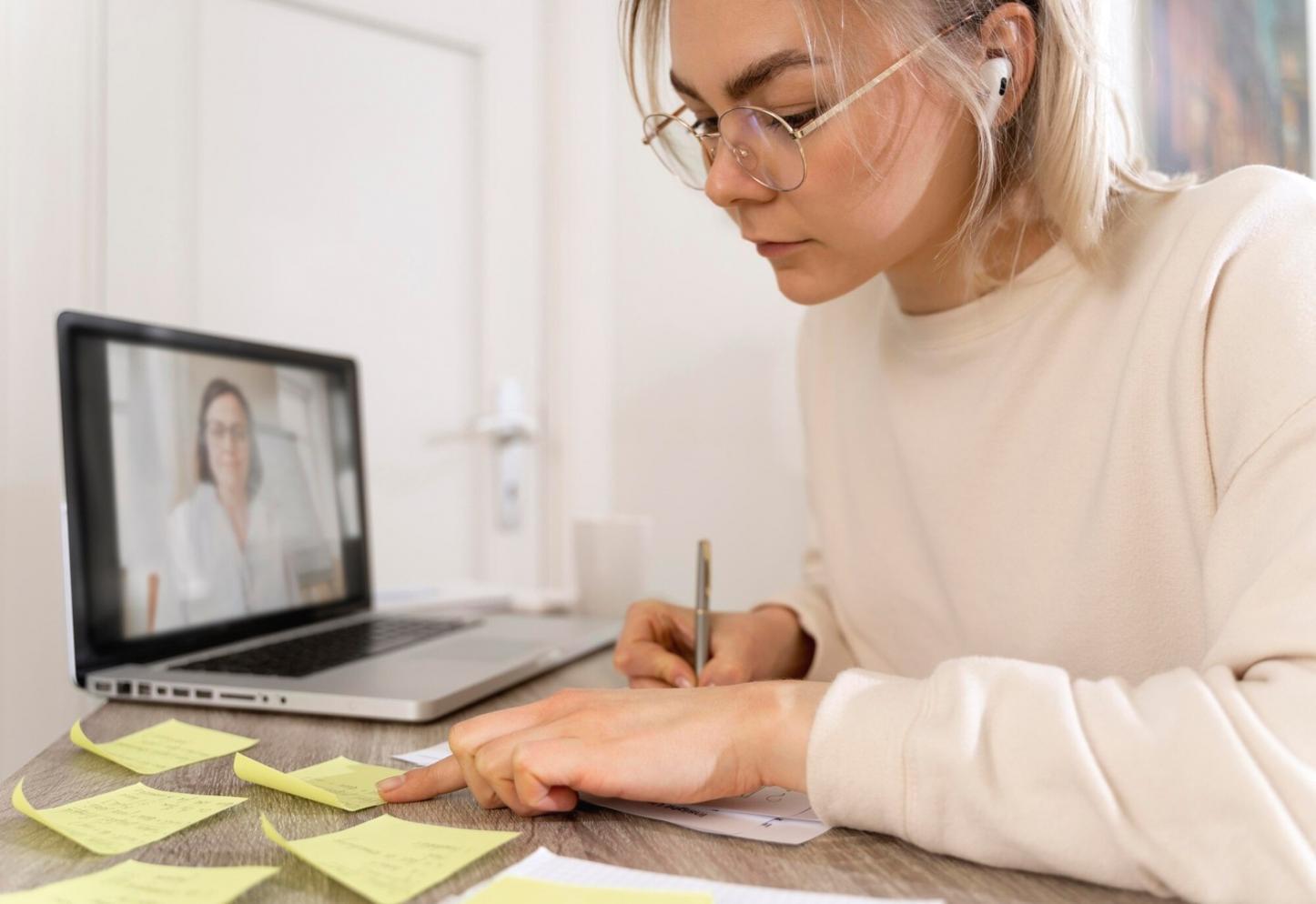 Business team reviewing quarterly budget adjustments in modern office setting